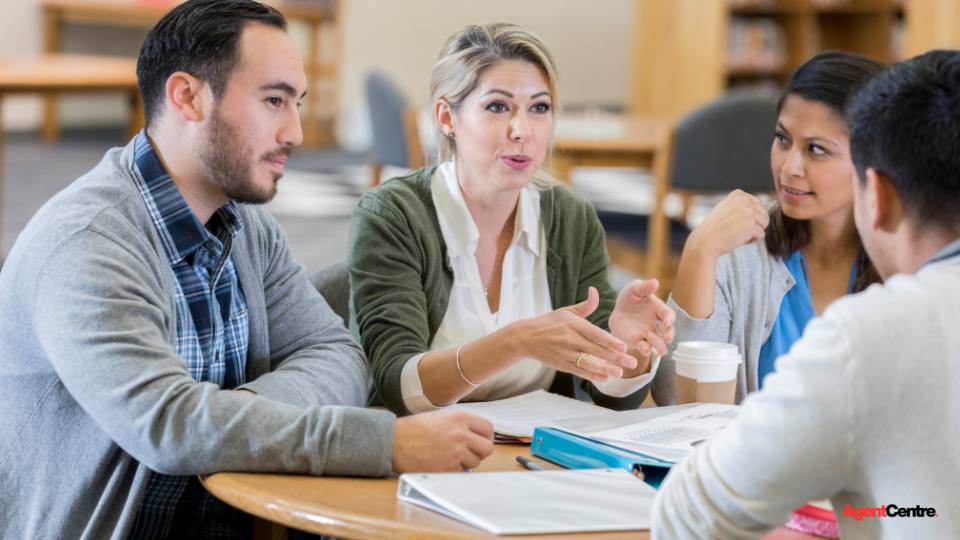A buyers agent discussing downsizing options with clients