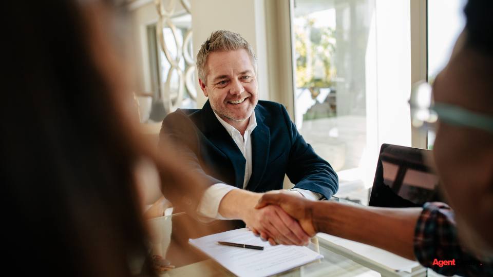 A successful first-home purchase, sealed with a handshake